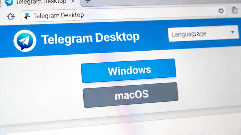 步骤一截图：Telegram官方网站桌面客户端下载页面，显示Windows和macOS下载按钮